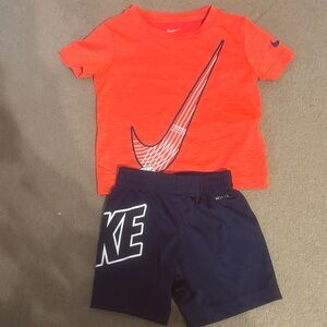 Nike Bright Orange Tee and Dark Blue Shorts